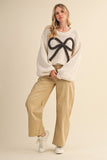 Bowtique Sweater